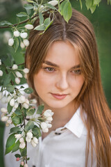 Naklejka premium Portrait of a red-haired beauty in the spring nature 2951.
