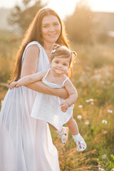 The girl and her mother are basking in the spring sunshine 3027.