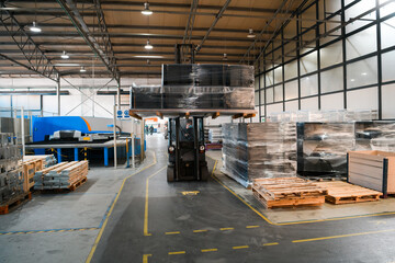 Forklift loader in storage warehouse ship yard. Distribution products. Delivery. Logistics. Transportation. Business background