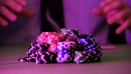 The man plays in the casino.