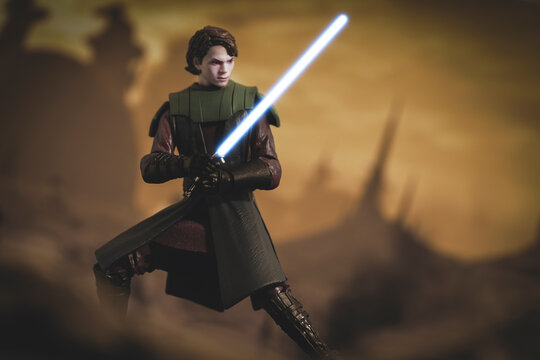 NEW YORK, USA - JUNE 17 2021:  Star Wars The Clone Wars Jedi General Anakin Skywalker with lightsaber - Hasbro action figures