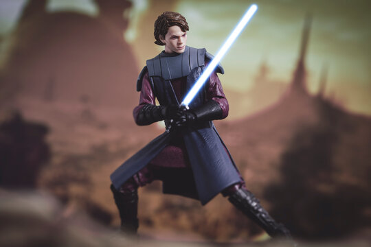 NEW YORK, USA - JUNE 17 2021:  Star Wars The Clone Wars Jedi General Anakin Skywalker with lightsaber - Hasbro action figures