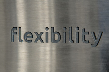 Engraving a cnc machine on a piece of metal. Engraving flexibility text 