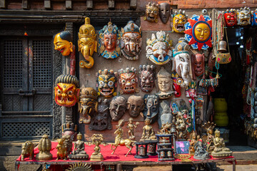 Wooden masks and handicrafts on sale at local shop in the Thamel market, Thamel District of...