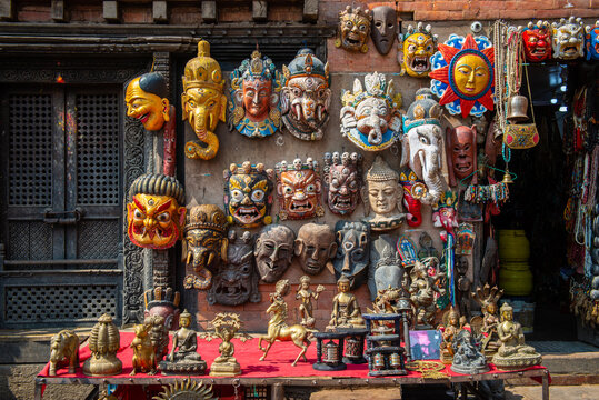 Wooden masks and handicrafts on sale at local shop in the Thamel market, Thamel District of Kathmandu, Nepal. 