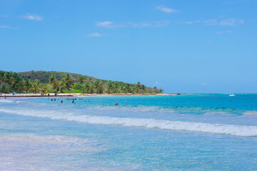 Fototapeta na wymiar caribbean sand beach and blue sky