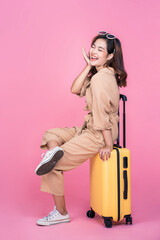 Beautiful attractive Asian woman smiling happy excited traveling holiday summer vacation trip...