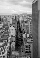 SAO PAULO, BRAZIL - JUNE 11, 2021: Skyline view of Sao Paulo in a cloudy day black and white B&W Including downtown Paulista Avenue buildings famous and historical places