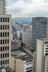 Fototapeta na wymiar SAO PAULO, BRAZIL - JUNE 11, 2021: Skyline view of Sao Paulo in a cloudy day Including downtown Paulista Avenue buildings famous and historical places