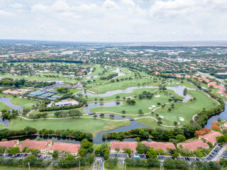 Fototapeta na wymiar aerial drone of Golf course and city In Plantation, Florida 