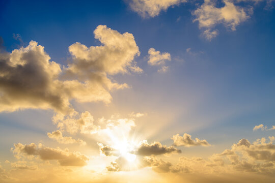 Sun Shining Through Clouds