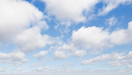 Cumulus clouds in blue sky