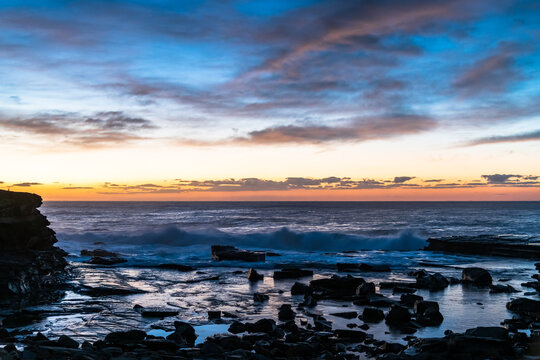 Sunrise Seascape at Rocky Inlet with colourful high cloud