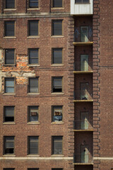 Brick Textured City Building with Harsh Shadows