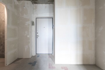 interior of the apartment without decoration in gray colors