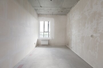 interior of the apartment without decoration in gray colors