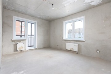 interior of the apartment without decoration in gray colors