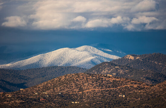 LIGHT SNOW ON THE FOOTHILLS OF THE SANGRE DE CRISTO MOUNTAINS, SANTA FE, NM, USA