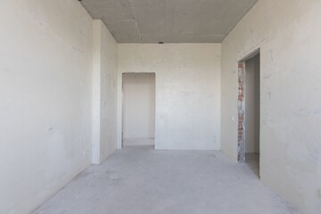 Fototapeta premium interior of the apartment without decoration in gray colors