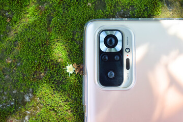 Smartphone backside primary camera with wide lens and macro lens with depth sensor and  laser...