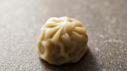 Close-up of steamed dumplings on marble