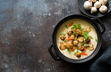 Julienne mushroom or casserole in black pot