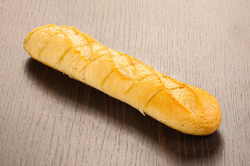 Crust tasty baguette over board