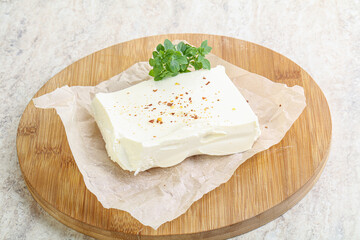 Greek Feta cheese over board