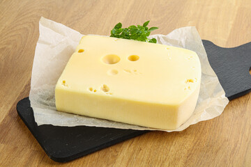 Maasdam cheese over the board