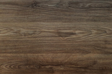 Naklejka premium Brown wooden background. Wood dark abstract texture.