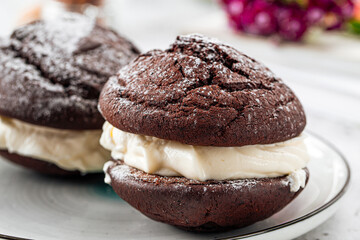 Fresh baked american chocolate whoopie pies with cream filling © Hihitetlin