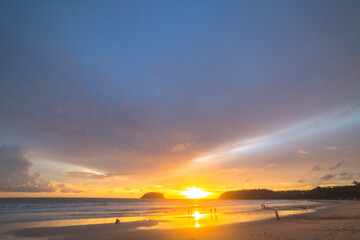 Scene of Colorful romantic sky sunset with Changing the color of the sky background . .beautiful cloud at sunset above island in nature and travel concept..