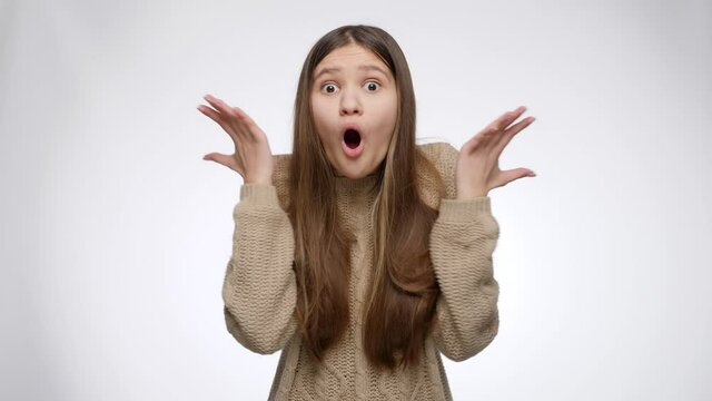 Happy amazed girl cheering and feeling surprized after winning in lottery or victory in game