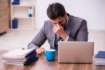 Young businessman employee working in the office