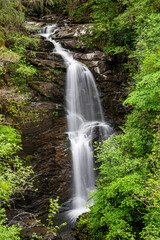 Fototapeta na wymiar Photography of waterfall in forest