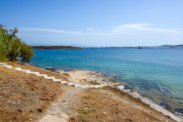 Monastiri Beach (the beach of the monastery of Agios Ioannis) located in a small rocky bay surrounded by rocky hills. Paros island, Cyclades, Greece