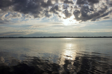 Obraz premium Morning landscape on the Volga river. Reflection of the sky in the water. Rssia.