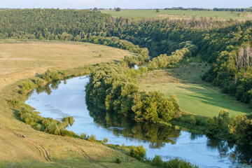 Fototapeta na wymiar View from the hill to the Beautiful Mecha. River. Summer. Day. Russia