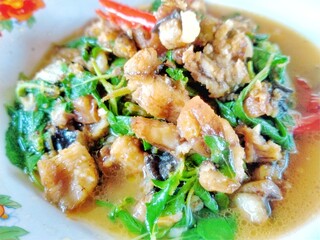 Stir Fried Eel with Basil, Eel meat that is perfectly cooked. The name of the menu is stir-fried basil.