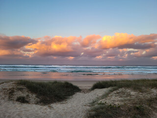 Cloudy beach sunset from sand dunes