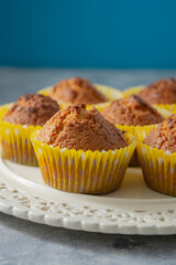 Homemade healthy muffins, banana snack bakes. Gluten and sugar free. Blue background. Sweet dessert