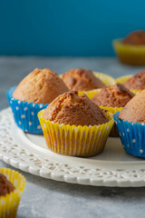 Homemade muffins, delicious bakes. Sweet dessert food, pastry and bakery concept