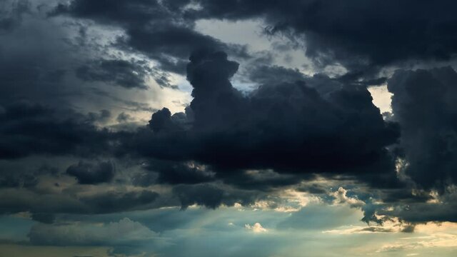 beautiful dark dramatic sky with stormy clouds time lapse before the rain 
