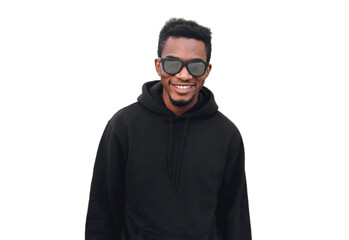 Portrait close up of happy smiling young african man wearing a blank black hoodie, sunglasses isolated on a white background