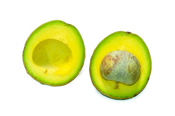 Two slices of booth avocado isolated on the white background. Booth avocado originates from the Americas, has bright yellow, flexible and delicious meat with many nutrients good for human health