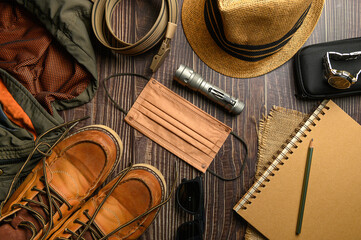 Trendy face mask with others accessories on the table