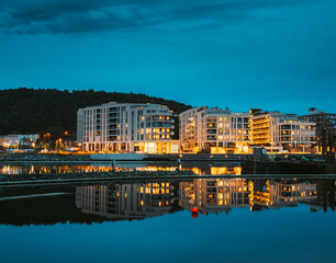 Fototapeta na wymiar Oslo, Norway. Scenic Night Evening View Of Illuminated Residential Area District Downtown Sorenga