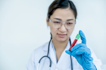 The doctor hand holding the blood tube of the patient, medical check-up concept