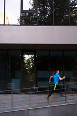 Man running in the city. Fitness workout, sport lifestyle concept