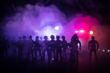 Anti-riot police give signal to be ready. Government power concept. Police in action. Smoke on a...